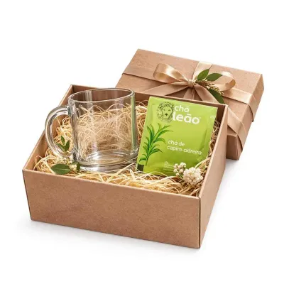 1 Caixa 14x14x10cm kraft com logo 01 cor 1 Caneca vidro 350ml 1 Sachê de chá (sabor disponível) P...