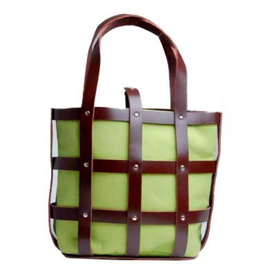 Bolsa de couro com saco de lona intercambiável