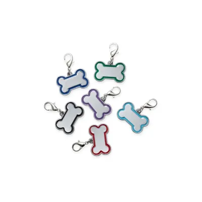 Chaveiro metálico de identificação para pets, dimensão 3,3 x 2,3 cm. Acompanha gancho.