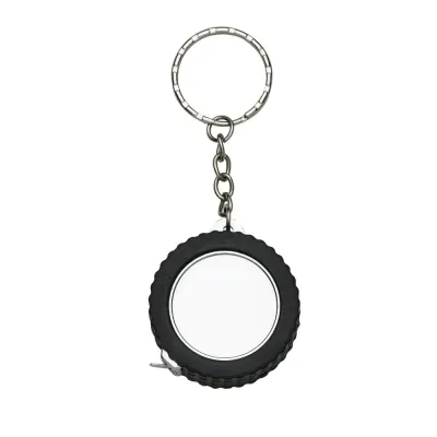 Chaveiro trena 1 metro formato pneu brilhante, material emborrachado com relevo. Detalhes do aro ...