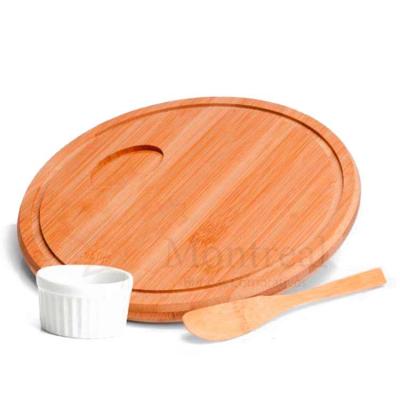 Conjunto para petiscos em Bambu. Acompanha tábua e espátula em Bambu e ramekin.