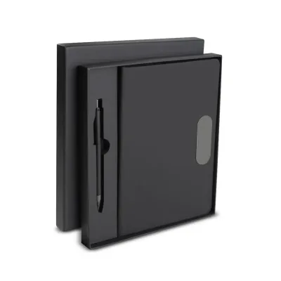 Elegância e organização em um único kit. Caderno A5 com capa em PU, caneta metálica e estojo presenteável para brindes corporativos de alto valor perc