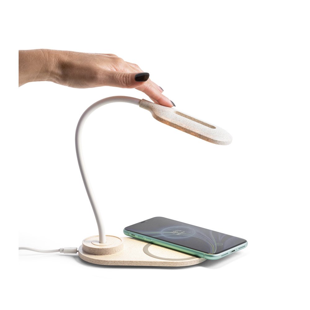 Luminária de mesa com carregador wireless.
