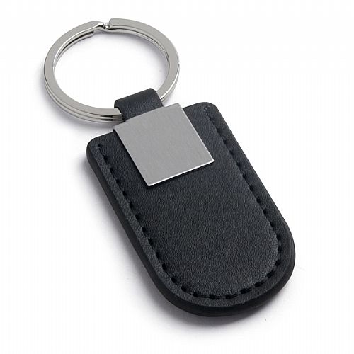 Chaveiro em couro sintético e metal.