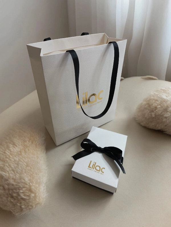 Sacola, caixa e fita personalizada